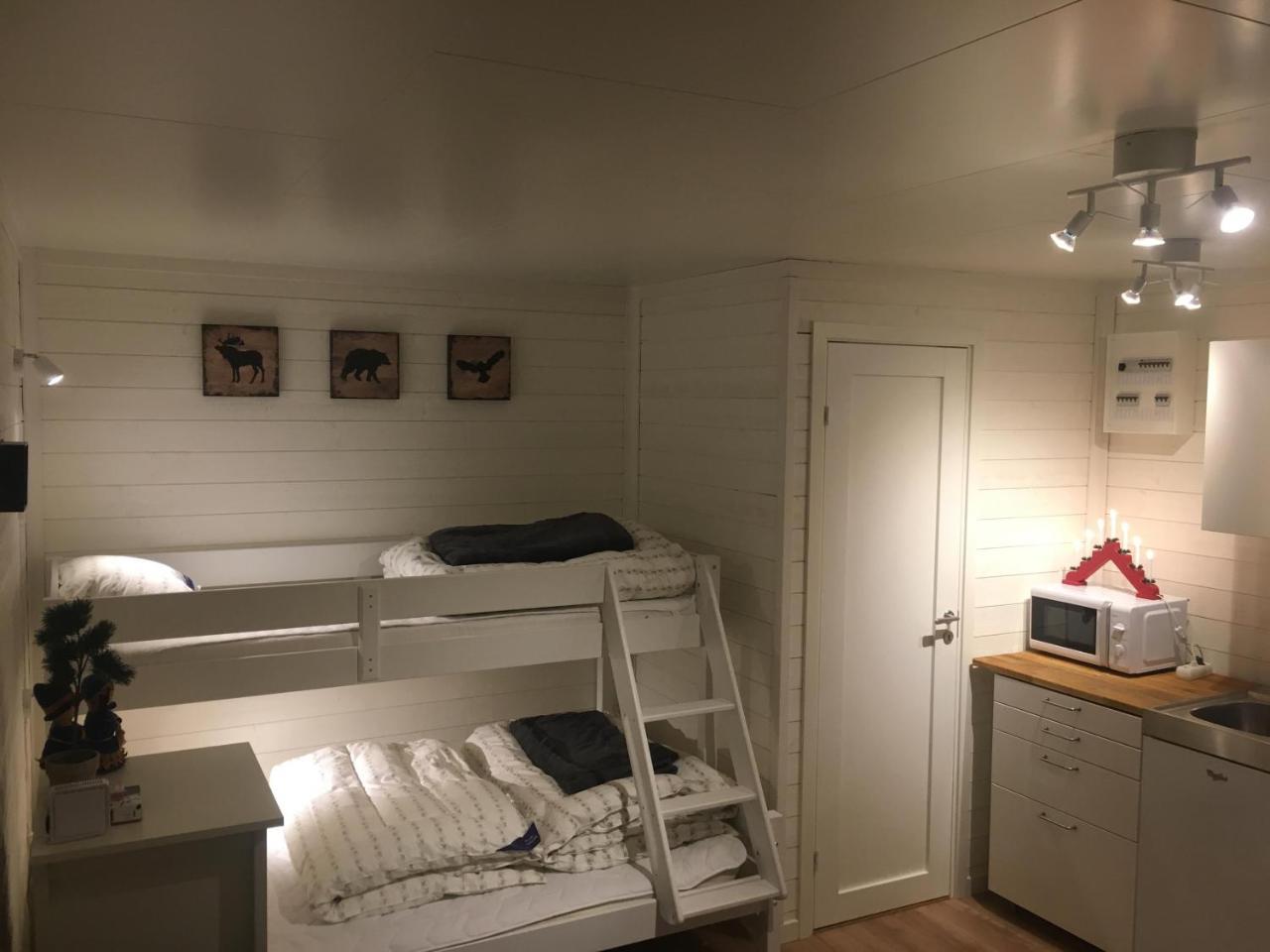 Camp Caroli Wooden Cabins Jukkasjarvi Bagian luar foto